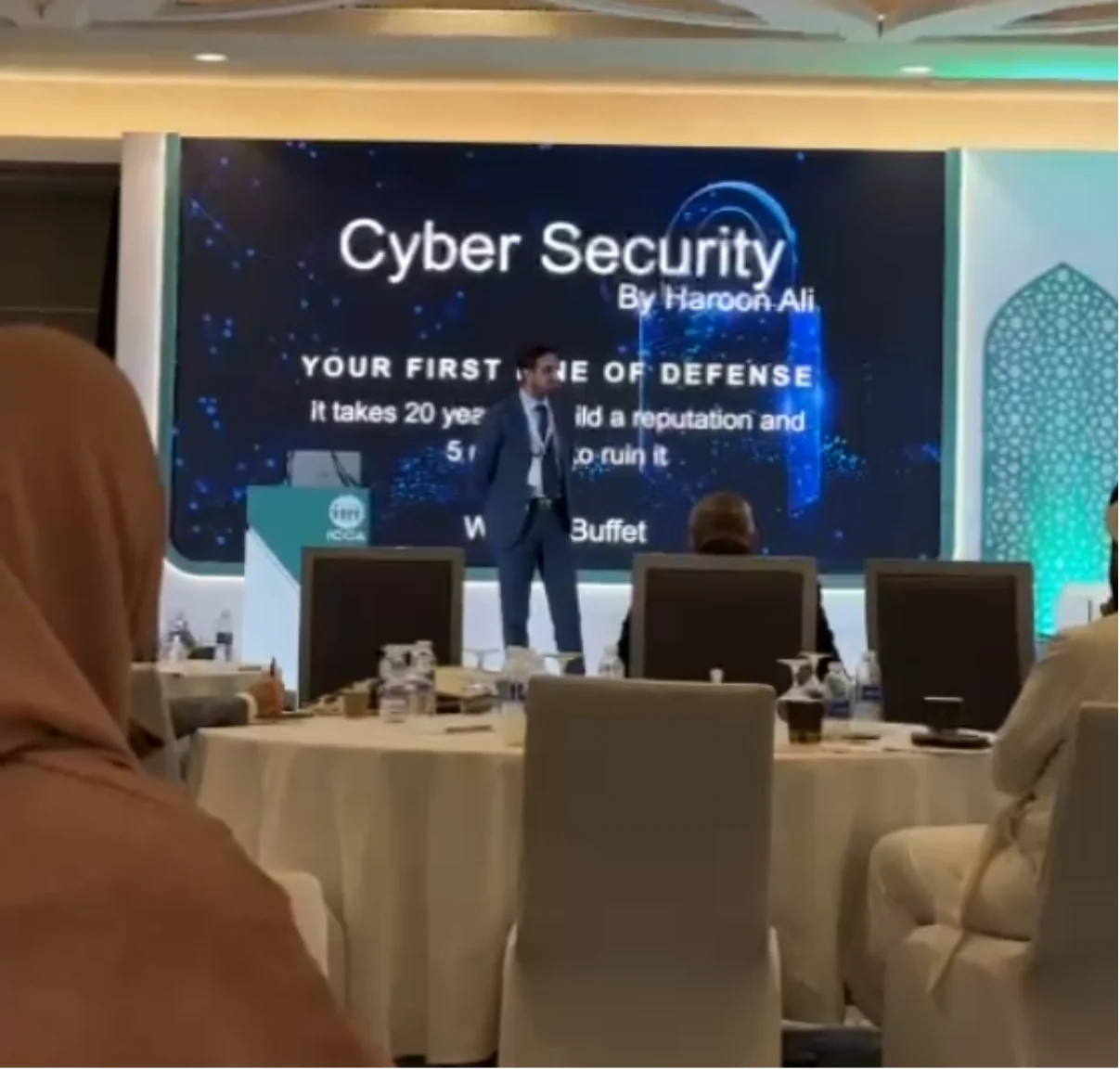 Haroon Ali addressing a cybersecurity conference audience
